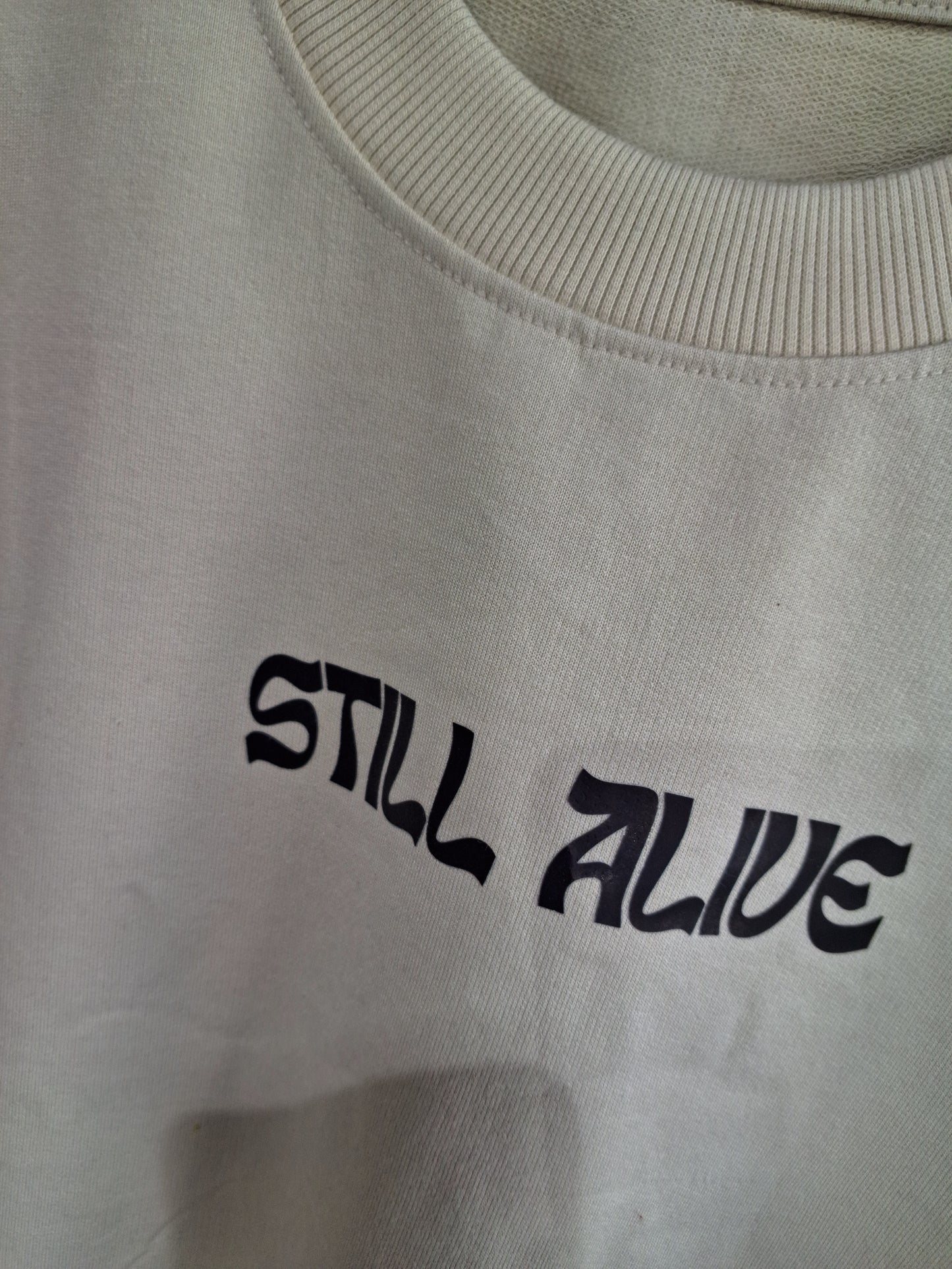 06 STILL ALIVE OVERSIZED PRINT T SHIRT